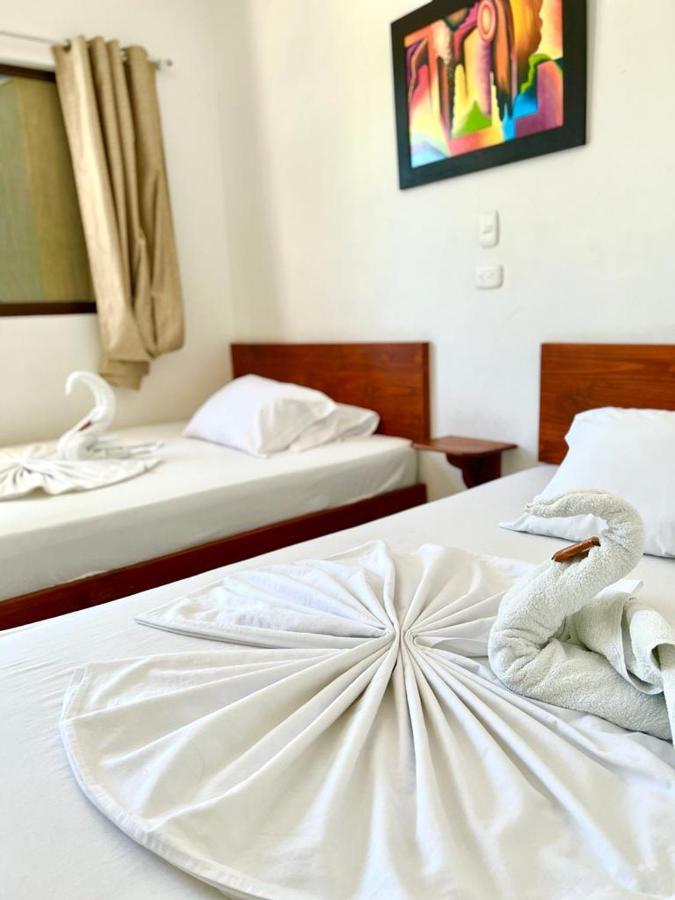 Hotel Paraiso Plaza Puerto Triunfo Esterno foto