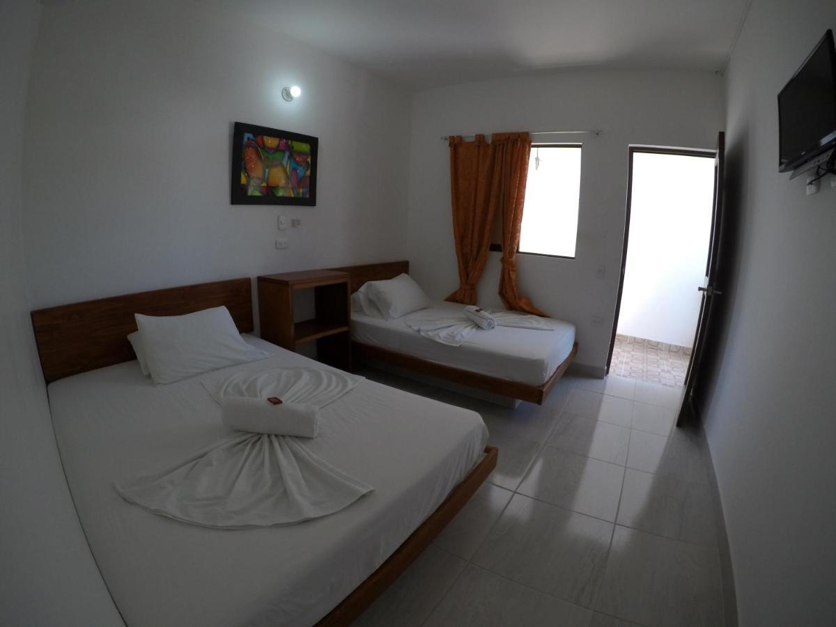 Hotel Paraiso Plaza Puerto Triunfo Esterno foto